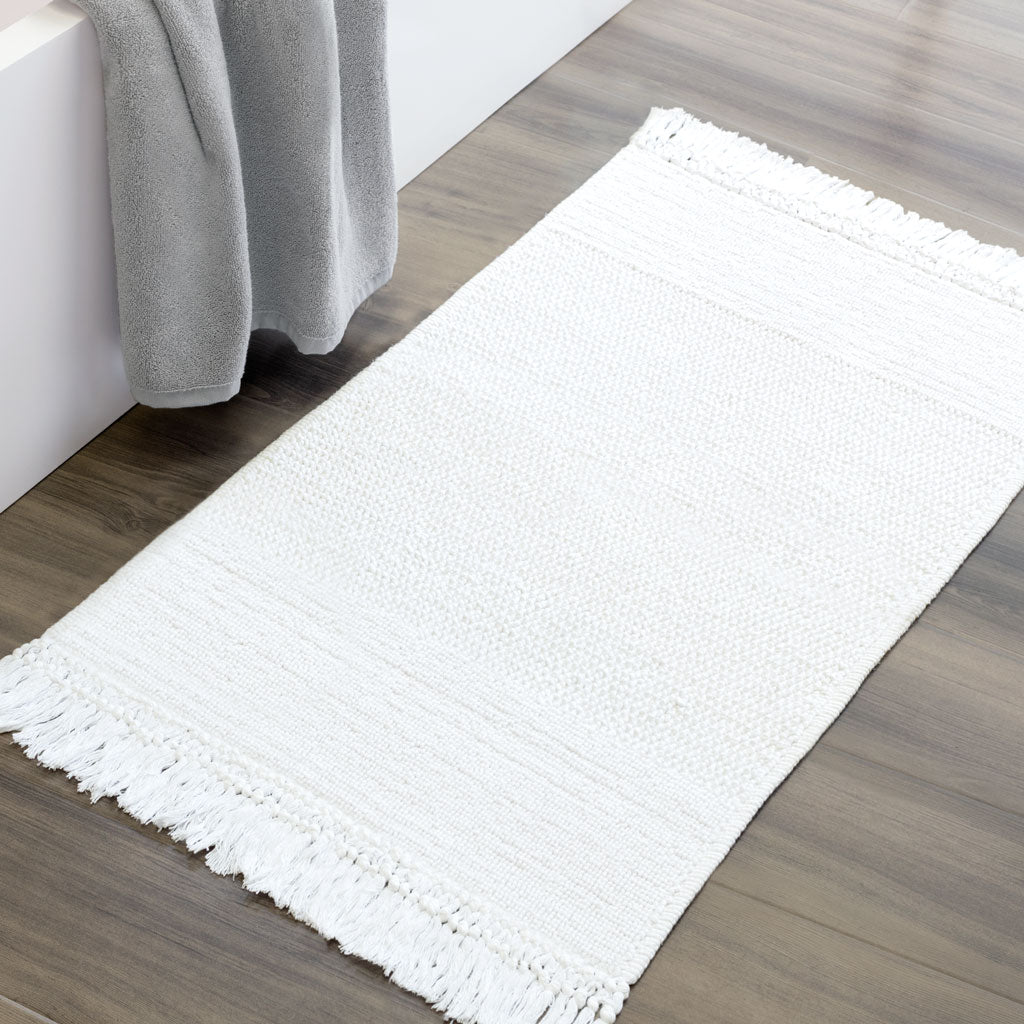 The White Fringed Textured Bath Mat – Crane Canopy
