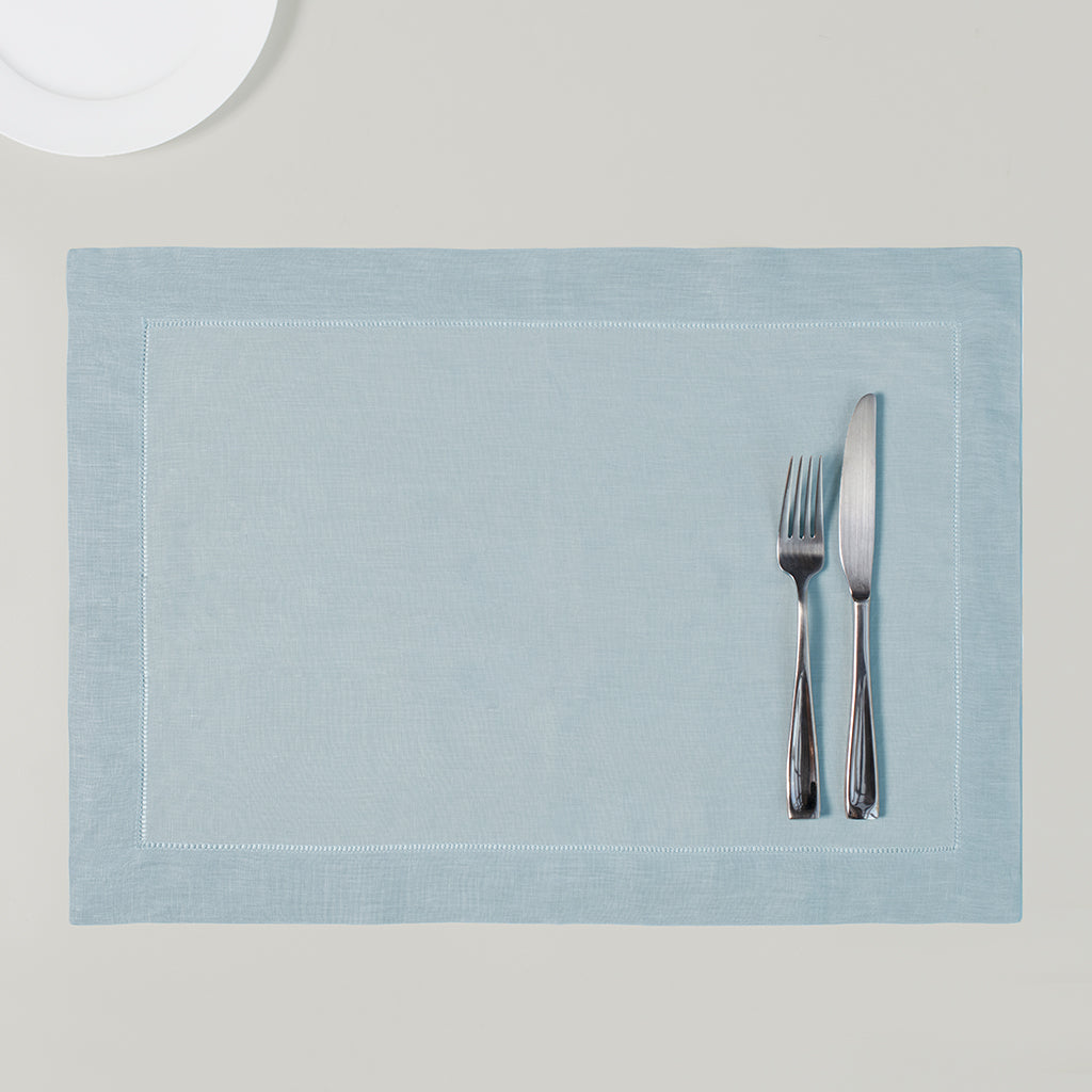 https://www.craneandcanopy.com/cdn/shop/products/The_Classic_Hemstitch_Linen_Placemat_Blue_1024x1024.jpg?v=1573513002