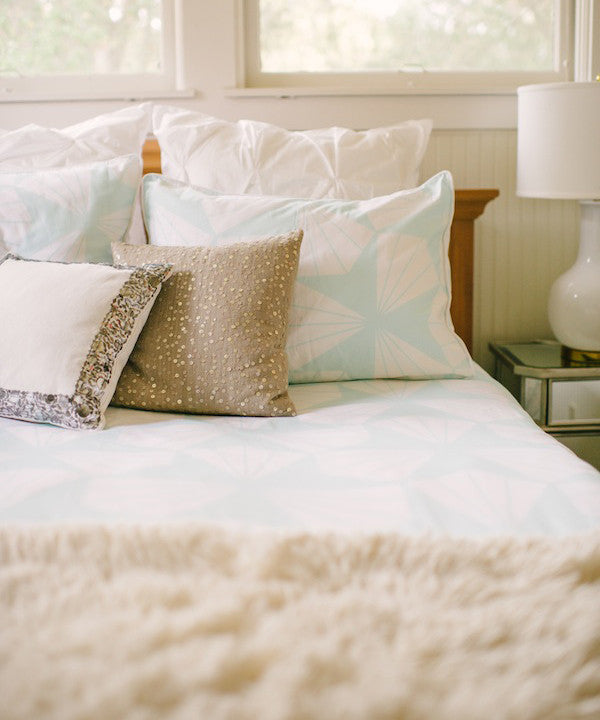 Crane and Canopy Designer Bedding as seen in Taylor Sterling